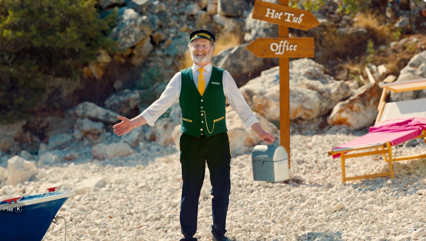The Dream Inspector character on a beach
